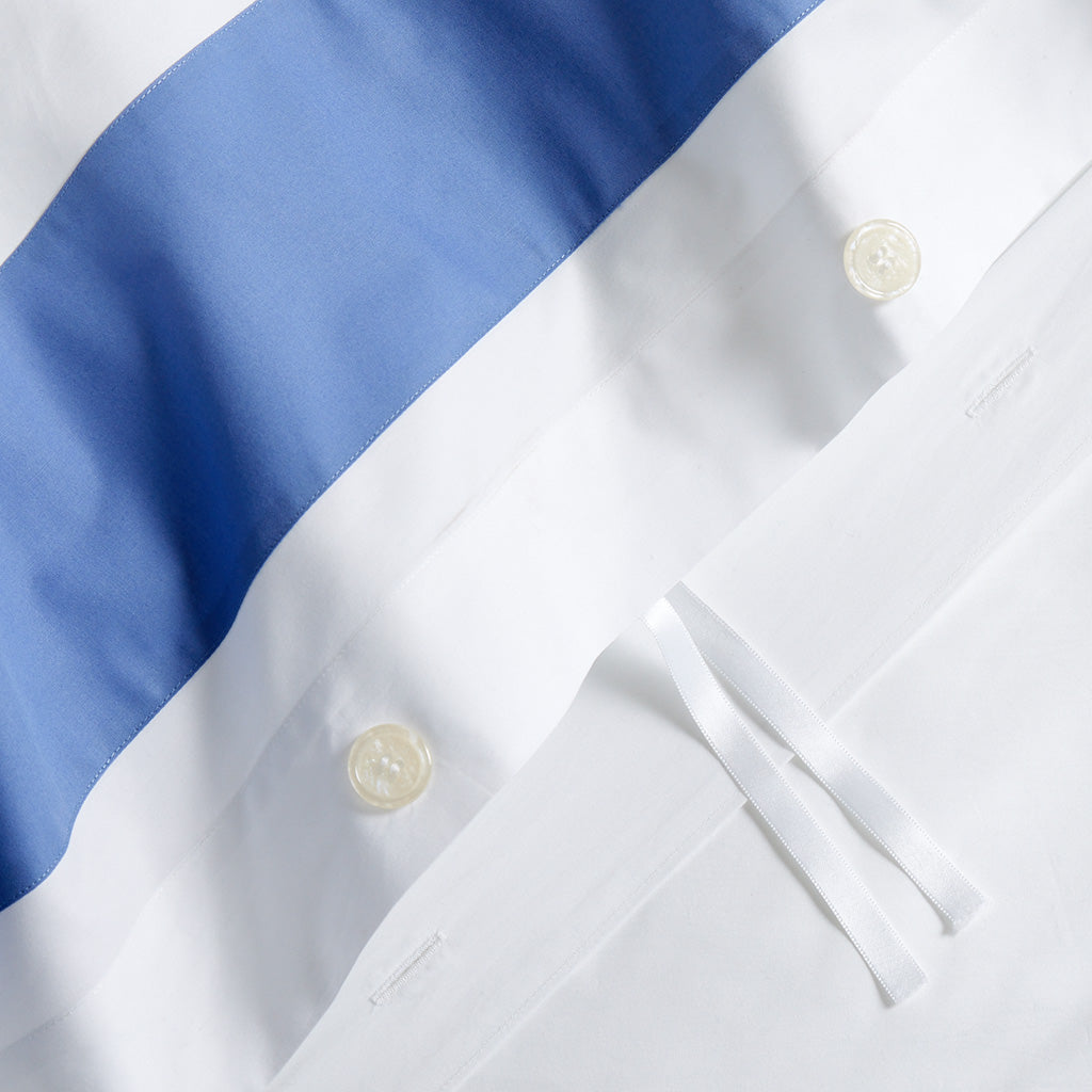 White and blue duvet with corner ties hidden buttons