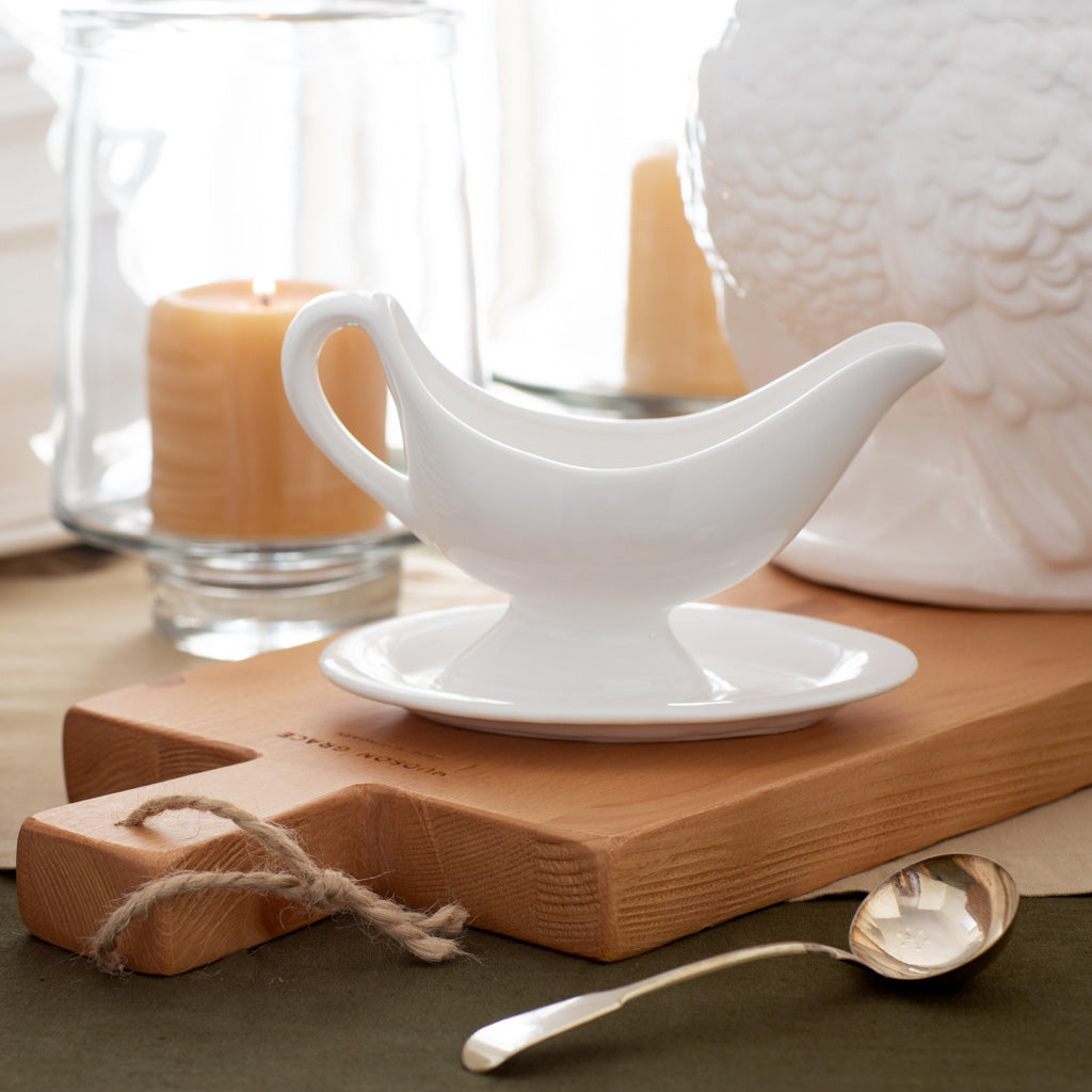 white ceramic gravy boat