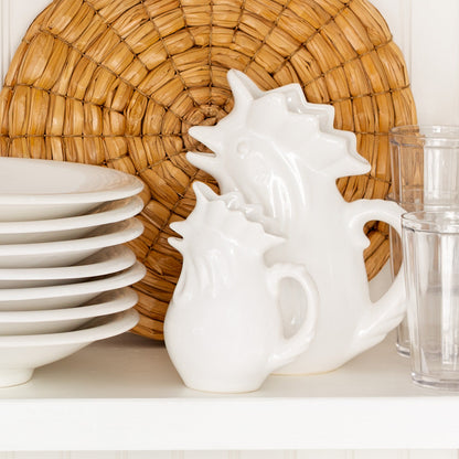 white ceramic pitcher rooster