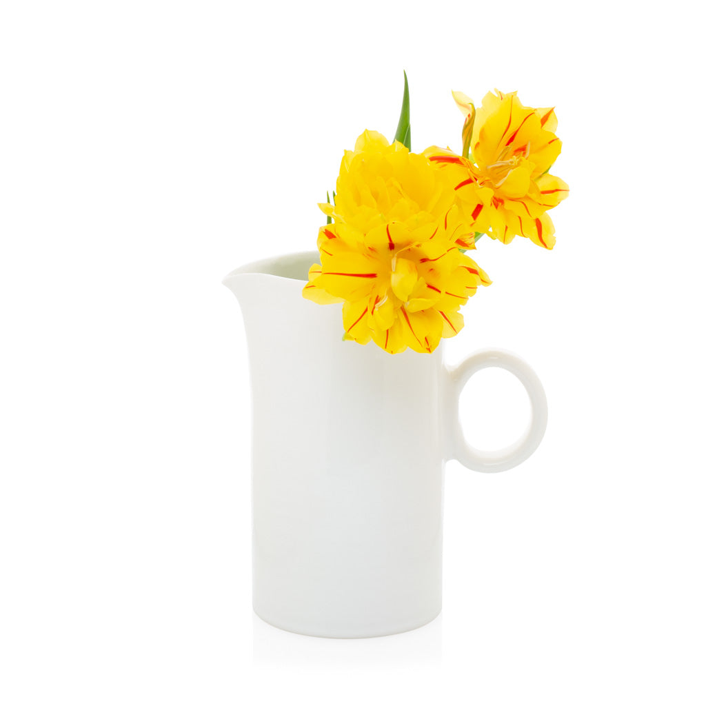 white ceramic mug ring handled