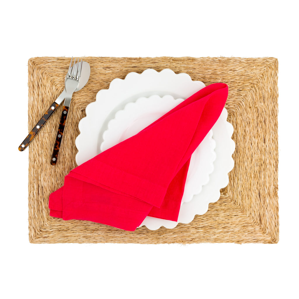 beige woven placemat with table setting 