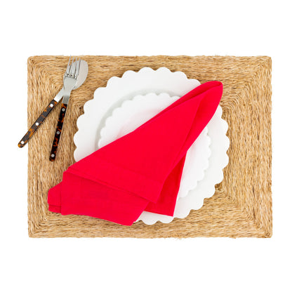 beige woven placemat with table setting 