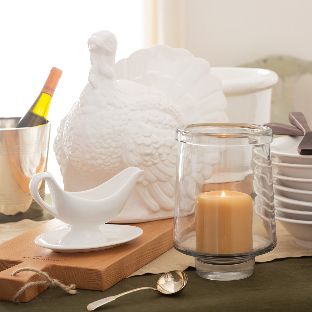 white gravy boat with turkey centerpiece 